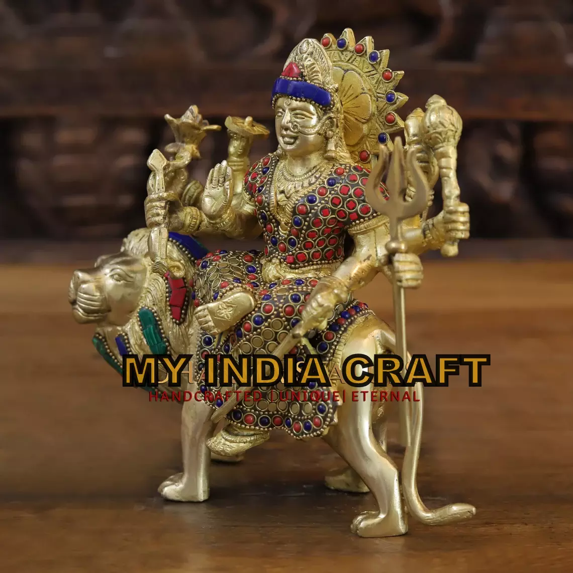 Ambe maa statue on lion